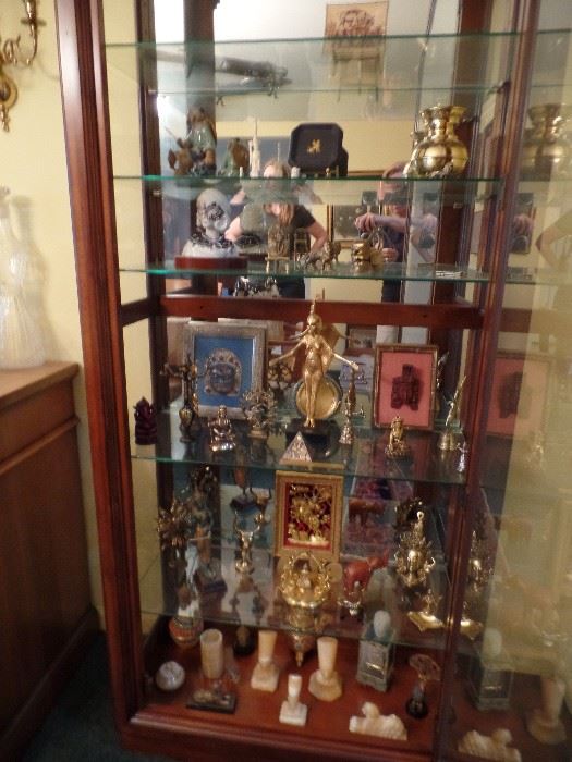Lighted curio cabinets filled with treasures