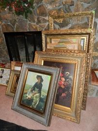 More framed art and empty frames. Many are oil paintings