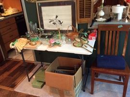 Fun bottle covers, glassware, 2 vintage brass mirror vanity sets & picture. Great wooden chair. Box of RR train tracks, some flower foam