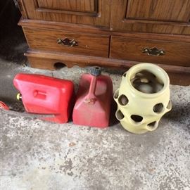 gas cans, strawberry planter