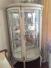 Antique bow-front china cabinet