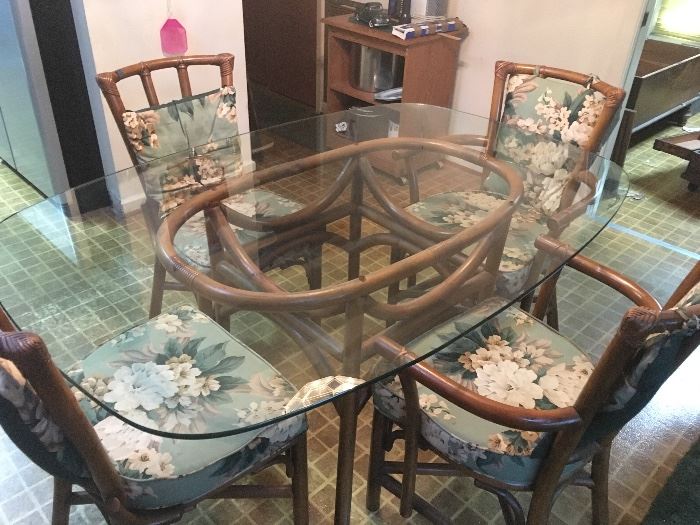 glass and wood table and  6 chairs
