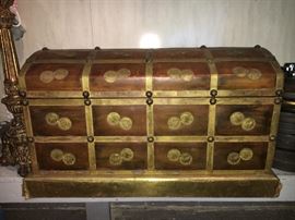Leather, vintage trunk with odd coins all over it!