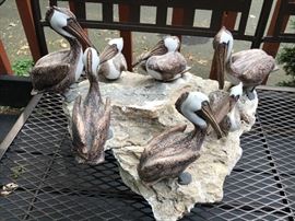 Sculpture of pelicans on rock