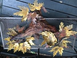 Sculpture - metal leaves on wood