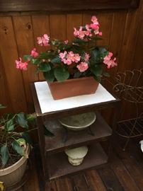 Metal table with begonia