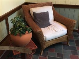 Wicker chair with cushions