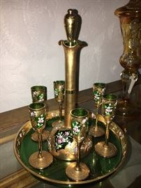  Not perfect, but pretty darn close. Quite beautiful, Emerald Green with hand-painted design  and gold gilt.