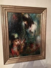 Lovely oil on canvas depicting woman with a child. Signed by artist.