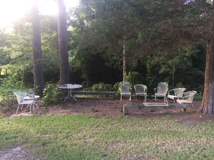 Classic outdoor furniture. Table with 4 chairs, 2 rockers, round side table, coffee table, glider, and long primitive style benches. 