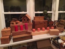 Very large collection of primitive boxes and handmade candle troughs.