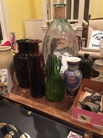 Great assortment of decorative glass jars, jugs, and bottles. 