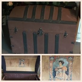 Wonderful antique steamer trunk, high dome style. Original art under lid. Trunk on casters 
