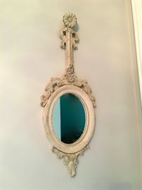A pair of decorative french mirrors