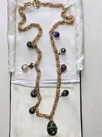Russian Faberge Style Charm Necklace purchased on 5th Avenue, NYC 25 years ago...8 smaller charms and one larger egg