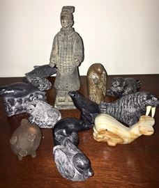 Chinese Terracotta  clay warrior and surrounding friendly creatures.