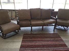 very nice patio furniture--settee and 3 swivel chairs (one not photographed)