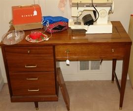 Sewing table and sewing machine 