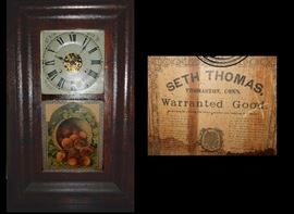 Antique Seth Thomas clock approximately two feet high one foot wide