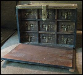 Magical little wooden and brass spice chest with nine drawers
