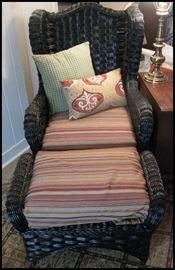  Oversize cushioned black wicker chair and ottoman