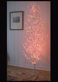  Sparkly white Christmas tree with multi-colored lights