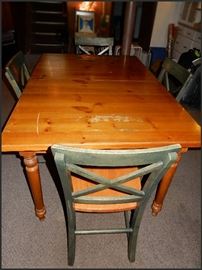 Wooden table with one leaf and four chairs