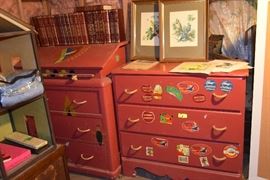 Pair of fun painted vintage dressers decorated with vintage stickers.