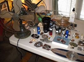 2 electric fans belt buckles flash lights and more.