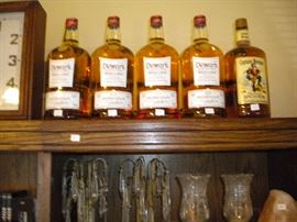 4 gallons - dewars 1 gallon Captain Morgan