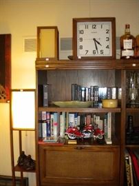 Clock, Mid century lights, books speaker and book case.