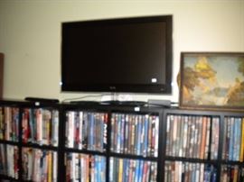 Flat screen TV and 100's of DVD's