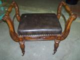 See next picture--storage under cushion and checkerboard underneath