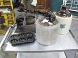 Great primative crock jugs and cast iron pieces including Griswold
