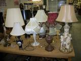 TABLE FULL OF GREAT LAMPS.
