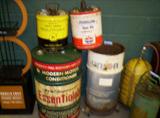 LOTS OF OIL 5 GAL CANS AND 30 GAL DRUM
