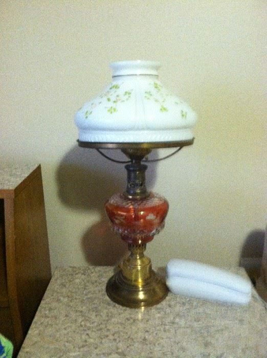 Antique Rose Lamp converted to electricity. Hand panted rose design on shade. 