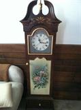 Great floor clock with inside cabinetry for storage.