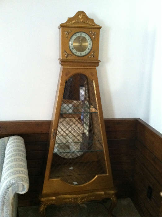 Clock and curio cabinet in one.  Dated May 1963 on back.