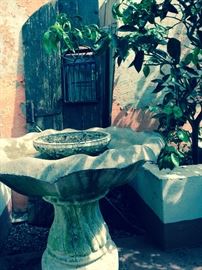 large bird bath, old wooden door