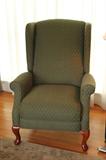 Wing back chair also a recliner.