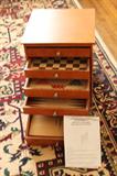 Multi drawer storage and game table with game pieces.