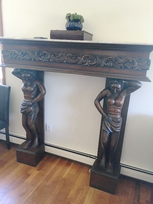 Carved fireplace mantle