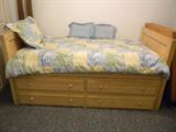 captain's twin bed with underneath storage in blond wood