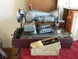 Antique sewing machine with attachments - Morse