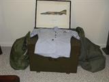 several miliary objects - bag with pilot's helmet and mask, field desk, top for woman's uniform