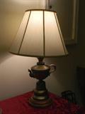 one of a pair of lamps in brass tones