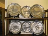 1 6-piece set of pewter historic plates (and also another 4 piece set of these pewter plates)