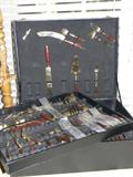large set of flatware in brass and wood