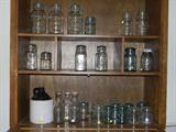 jug and jars of various sizes which are vintage (possibly antique)